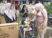 Bundo Emiko Serahkan BantuanKursi Roda kepada Lansia dan Penyandang Disabilitas