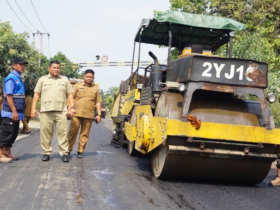 Jalan Simpang Tiga Sitiung Lama Pulai Diaspal, Akses Tiga Kecamatan Makin Lancar
